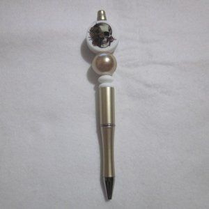 Gold Beaded Skull Pen.